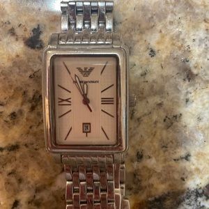 Vintage Armani watch! I do have the original box as well.